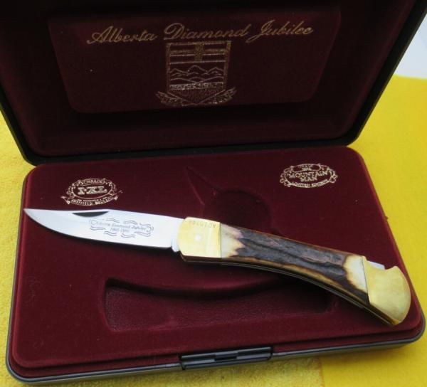 Schrade I*XL Lock back Folding Knife. Alberta Jubilee. NIB. ..............(R4)