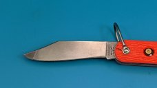 Camillus New York Paratrooper Emergency Rescue Knife. Orange Jigged Delrin Handles, Steel Shackle.