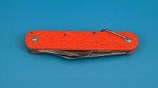 Camillus New York Paratrooper Emergency Rescue Knife. Orange Jigged Delrin Handles, Steel Shackle.