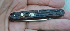 Geo. Schrade Presto Mint Jigged Brown Bone Never Used Factory Edge Sock Drawer Knife 3 1/4" Closed Geo. Schrade Presto Mint Jigged Brown Bone Never Used Factory Edge Sock Drawer Knife 3 1/4" Closed