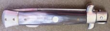 Vintage lockback MADE IN ITALY manual STILETTO KNIFE w/ cream brown & black HORN handle scales Vintage lockback MADE IN ITALY manual STILETTO KNIFE w/ cream brown & black HORN handle scales