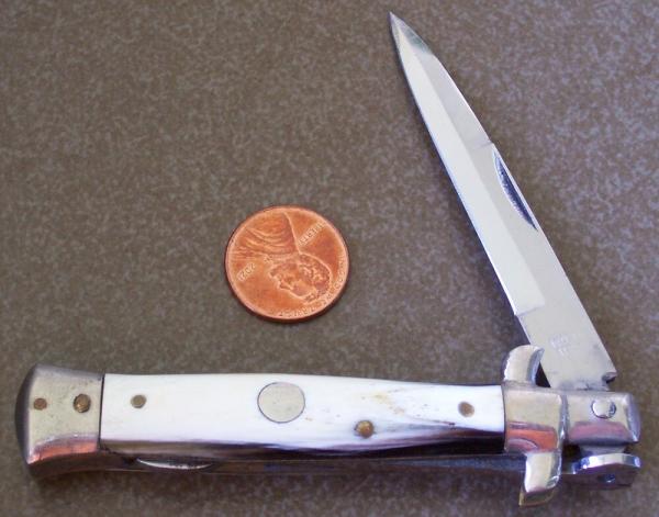 Vintage lockback MADE IN ITALY manual STILETTO KNIFE w/ cream brown & black HORN handle scales Vintage lockback MADE IN ITALY manual STILETTO KNIFE w/ cream brown & black HORN handle scales