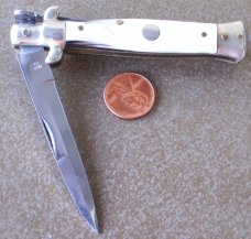 Vintage lockback MADE IN ITALY manual STILETTO KNIFE w/ cream brown & black HORN handle scales Vintage lockback MADE IN ITALY manual STILETTO KNIFE w/ cream brown & black HORN handle scales