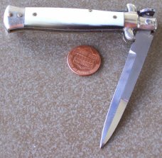 Vintage lockback MADE IN ITALY manual STILETTO KNIFE w/ cream brown & black HORN handle scales Vintage lockback MADE IN ITALY manual STILETTO KNIFE w/ cream brown & black HORN handle scales