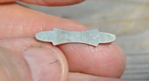 Bow Tie Style Shield 1" Made Of Nickel You are buying One Shield Sets With Epoxy Polishes Up Nicely