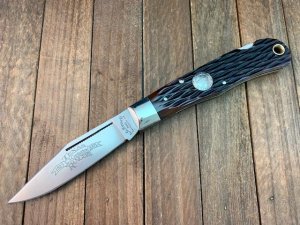 A.G. Russell Mountain Man Lockback 2001 Texas Ranger Commemorative Brown Jigged Bone 154-CM Blade
