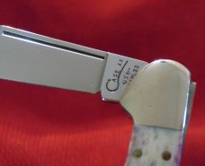 MIB 1997 CASE XX USA 61549L SS SMOOTH PURPLE BONE COPPERLOCK ITEM #02350 1 OF 950 MIB 1997 CASE XX USA 61549L SS SMOOTH PURPLE BONE COPPERLOCK ITEM #02350 1 OF 950