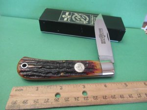 Queen Titusville PA. Amber Carved Stag Bone Mountain Man Pattern # 3
