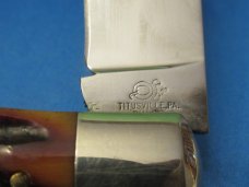 Queen Titusville PA. Amber Carved Stag Bone Mountain Man Pattern # 3 Queen Titusville PA. Amber Carved Stag Bone Mountain Man Pattern # 3