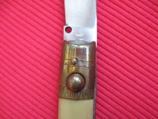 Vintage Italian Indiana Engraved Bolster Button Open/Close Switchblade Knife.
