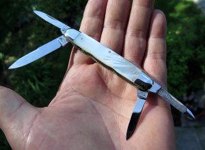 Vintage four blade E. Bruckmann Germany, pearl handled Congress style knife. Unused mint