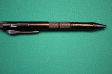 Novelty ballpoint pen with OTF locking blade