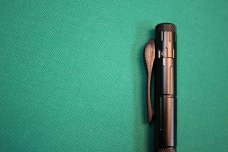 Novelty ballpoint pen with OTF locking blade