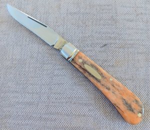 Robbie Ferreira Giraffe Bone Lannys Clip...N690..3.75" closed..fluted bolsters and double shields 