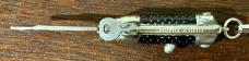 Miniature Switchblade Knife, Marked "HONG KONG", Black Checkered Handle, W/ Keychain, Unused Miniature Switchblade Knife, Marked "HONG KONG", Black Checkered Handle, W/ Keychain, Unused