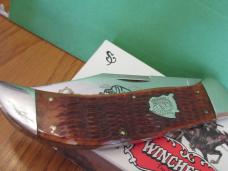 Winchester Buffalo Head Series Burnt Orange Bone Clasp Pattern # W18 19108 BH