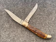 CASE XX 6265 Flat Grind Green Bone Folding Hunter