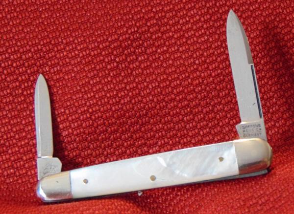 NEAR MINT VINTAGE SIMMONS HDWE.CO. GERMANY GENUINE PEARL SLEEVEBOARD KNIFE HORNET 1890-1940 NEAR MINT VINTAGE SIMMONS HDWE.CO. GERMANY GENUINE PEARL SLEEVEBOARD KNIFE HORNET 1890-1940