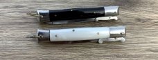 Two Rizzuto s  Imit Pearl and Jet black scales (a matching set} 
