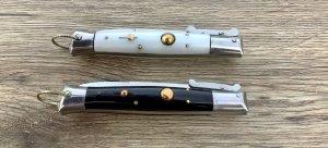 Two Rizzuto s  Imit Pearl and Jet black scales (a matching set} 