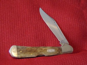 MIB 1997 CASE XX USA  61549L SS FLOATING DOTS SMOOTH MOLASSIS BONE COPPERLOCK  ITEM #02232 1 OF 1000