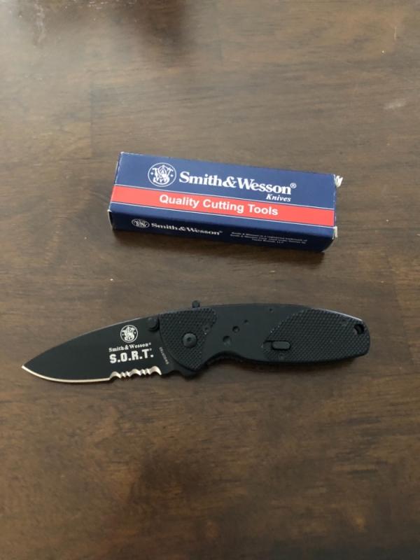 Smith & Wesson S.O.R.T. knife - SWSORTBS - Black Coated Partially Serrated Blade Smith & Wesson S.O.R.T. knife - SWSORTBS - Black Coated Partially Serrated Blade