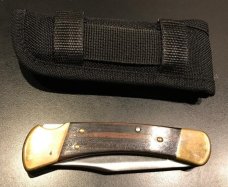 Vintage 1980s Buck 110 "Four Dot" with Banana Sheath Vintage 1980s Buck 110 "Four Dot" with Banana Sheath