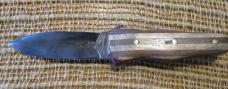 Unsigned, handmade, double-edged, fixed-blade knife