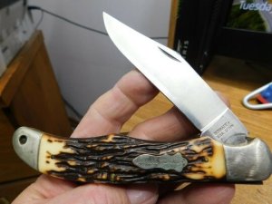 Vintage USA Schrade Uncle Henry 127UH folding hunter knife with leather sheath