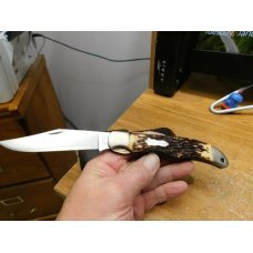 Vintage USA Schrade Uncle Henry 127UH folding hunter knife with leather sheath Vintage USA Schrade Uncle Henry 127UH folding hunter knife with leather sheath