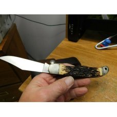 Vintage USA Schrade Uncle Henry 127UH folding hunter knife with leather sheath Vintage USA Schrade Uncle Henry 127UH folding hunter knife with leather sheath