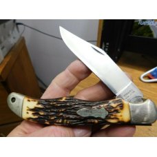 Vintage USA Schrade Uncle Henry 127UH folding hunter knife with leather sheath Vintage USA Schrade Uncle Henry 127UH folding hunter knife with leather sheath