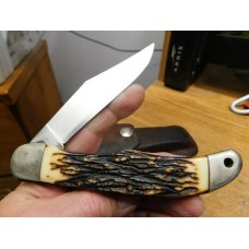 Vintage USA Schrade Uncle Henry 127UH folding hunter knife with leather sheath Vintage USA Schrade Uncle Henry 127UH folding hunter knife with leather sheath