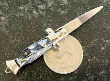 Miniature Switchblade Knife, Made In Italy, Vertical INOX Mark, Older Style, Imitation Horn Handle Miniature Switchblade Knife, Made In Italy, Vertical INOX Mark, Older Style, Imitation Horn Handle
