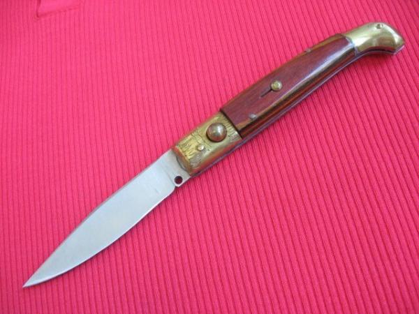 Vintage Italian Indiana Engraved Bolster Button Open/Close Switchblade Knife.
