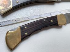 Pair of Vintage BUCK 110 Folders Pair of Vintage BUCK 110 Folders
