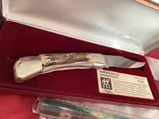 J A Henckels Large 5" Folding Hunter with Super Stag Handles in display. NOS and a beauty! J A Henckels Large 5" Folding Hunter with Super Stag Handles in display. NOS and a beauty!