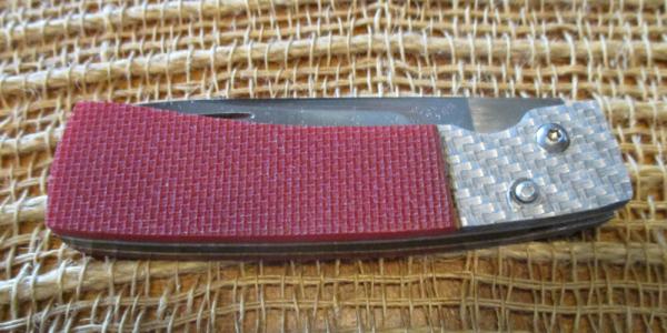 Bigler “98” folding knife, red and holographic silver handle