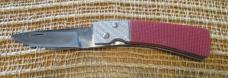 Bigler “98” folding knife, red and holographic silver handle