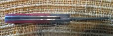 Bigler “98” folding knife, red and holographic silver handle
