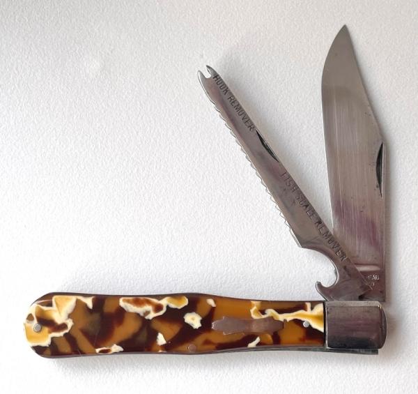 PARIS BEAD CELLULOID COKE BOTTLE FISH SCALER KNIFE PARIS BEAD CELLULOID COKE BOTTLE FISH SCALER KNIFE