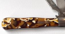 PARIS BEAD CELLULOID COKE BOTTLE FISH SCALER KNIFE PARIS BEAD CELLULOID COKE BOTTLE FISH SCALER KNIFE