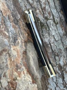 BUCK 110 AUTO BRASS BOLSTER WITH SHEATH & BOX