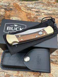BUCK 110 AUTO BRASS BOLSTER WITH SHEATH & BOX