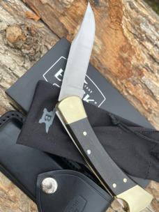 BUCK 110 AUTO BRASS BOLSTER WITH SHEATH & BOX