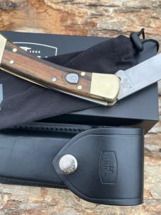 BUCK 110 AUTO BRASS BOLSTER WITH SHEATH & BOX