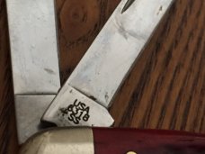 Case 6318 SS pocket worn red bone stockman edc