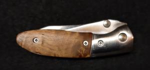Dual Action EDC hidden release with serrated edge.