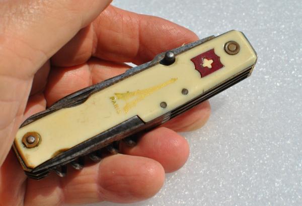 Pradel Extra France White Celluloid 8 Functions All Snap Tight 4" Closed
