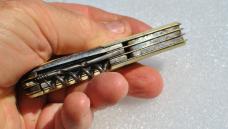 Pradel Extra France White Celluloid 8 Functions All Snap Tight 4" Closed